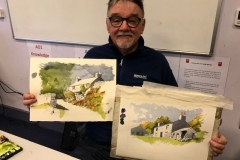 John Harrison with paintings from his demonstration and workshop